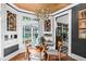 Cozy breakfast nook with large windows offering a view of the surrounding yard at 4455 Broadway St, Indianapolis, IN 46205