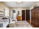 Inviting living room with hardwood floors, neutral walls, and comfortable seating at 4455 Broadway St, Indianapolis, IN 46205