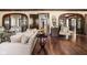 Bright living room with hardwood floors, decorative archways, and stylish furnishings at 4455 Broadway St, Indianapolis, IN 46205