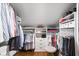 Spacious walk-in closet with custom shelving and ample storage space for clothing and accessories at 4455 Broadway St, Indianapolis, IN 46205