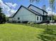 Spacious backyard with well-maintained lawn and black metal fence surrounding the perimeter of the property at 4655 Rockcress Ct, Zionsville, IN 46077
