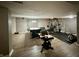 Finished basement with work out space and game table at 4655 Rockcress Ct, Zionsville, IN 46077