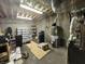 Utility view of basement providing storage solutions and necessary mechanical systems at 4655 Rockcress Ct, Zionsville, IN 46077