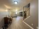 Finished basement with piano, treadmill, and staircase leading to the upper level at 4655 Rockcress Ct, Zionsville, IN 46077