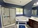Modern bathroom with a soaking tub, shower, and vanity with sink at 4655 Rockcress Ct, Zionsville, IN 46077
