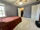 Bedroom with soft carpet, and a view into a closet at 4655 Rockcress Ct, Zionsville, IN 46077