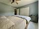 Bedroom showcasing a comfortable bed, and neutral wall color at 4655 Rockcress Ct, Zionsville, IN 46077