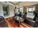 Inviting living room with hardwood floors, open layout, and staircase access at 4655 Rockcress Ct, Zionsville, IN 46077