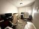 Home office space with two work areas and office chairs at 4655 Rockcress Ct, Zionsville, IN 46077