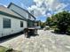 View of a stone patio with outdoor furniture, perfect for entertaining and enjoying the well-maintained backyard space at 4655 Rockcress Ct, Zionsville, IN 46077