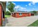 Concrete patio and brick house in backyard provide a great area for entertainment and enjoyment of the outdoors at 5015 Nowland Ave, Indianapolis, IN 46201