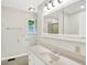 Bathroom with large mirror and vanity at 5015 Nowland Ave, Indianapolis, IN 46201
