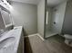 Bathroom featuring dual sink vanity and stand up shower at 5015 Nowland Ave, Indianapolis, IN 46201