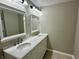 Bathroom showcasing double sink vanity with modern fixtures and ample counter space at 5015 Nowland Ave, Indianapolis, IN 46201