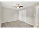 This bedroom features carpeted floors and a ceiling fan at 5015 Nowland Ave, Indianapolis, IN 46201
