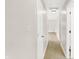 Neutral hallway with hardwood floors at 5015 Nowland Ave, Indianapolis, IN 46201