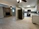 Open concept kitchen with stainless steel appliances and white cabinets at 5015 Nowland Ave, Indianapolis, IN 46201