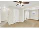 Living room featuring hardwood floors and a ceiling fan at 5015 Nowland Ave, Indianapolis, IN 46201