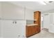 Mud room featuring storage cabinets, light-colored walls and wood-look floors at 5015 Nowland Ave, Indianapolis, IN 46201