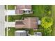 Aerial view of a home with a large, fenced backyard, spacious deck, and well-maintained landscaping at 5305 Traditions Rd, Indianapolis, IN 46235