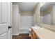 Clean bathroom featuring a shower-tub combination and a single sink vanity at 5519 Apple Branch Way, Indianapolis, IN 46237