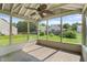 Covered porch with ceiling fan, and views of the backyard at 5519 Apple Branch Way, Indianapolis, IN 46237