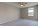 Bedroom featuring carpet, ceiling fan and a window with a view at 5527 Mahogany Dr, Noblesville, IN 46062