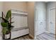 Mudroom with bench storage and greenery at 5527 Mahogany Dr, Noblesville, IN 46062