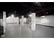 Wide-open basement area painted in neutrals with exposed pipes and ductwork at 555 N Oakland Ave, Indianapolis, IN 46201