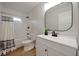 Bathroom with modern sink and hardware featuring a full shower and bathtub at 555 N Oakland Ave, Indianapolis, IN 46201