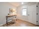 Spare bedroom with hardwood floors featuring a desk and stool at 555 N Oakland Ave, Indianapolis, IN 46201