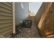 HVAC unit on the side of the home with rock landscaping at 555 N Oakland Ave, Indianapolis, IN 46201