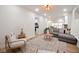 Spacious living room showcases an open layout and stylish decor throughout the house at 555 N Oakland Ave, Indianapolis, IN 46201