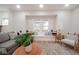 Bright living room featuring a large window seat and stylish decor at 555 N Oakland Ave, Indianapolis, IN 46201