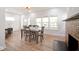 Bright living room with hardwood floors, fireplace, and plenty of natural light at 555 N Oakland Ave, Indianapolis, IN 46201