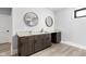 Stylish bar area with stone countertop, modern fixtures and dark wood cabinets at 5678 N College Ave, Indianapolis, IN 46220