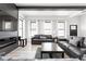 Cozy living room setup with sleek furniture and a decorative fireplace at 5678 N College Ave, Indianapolis, IN 46220