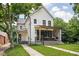 Beautiful home featuring a covered back porch at 5678 N College Ave, Indianapolis, IN 46220
