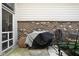 Back patio featuring a covered BBQ grill at 5832 Buskirk Dr, Indianapolis, IN 46216