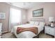 Cozy bedroom with bright light from the window at 5832 Buskirk Dr, Indianapolis, IN 46216