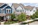 Charming two-story home with landscaped front yard, sidewalk, and colorful siding at 5832 Buskirk Dr, Indianapolis, IN 46216