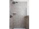 Tiled shower with rainfall shower head and built in shelf at 5832 Buskirk Dr, Indianapolis, IN 46216