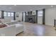 Spacious finished basement with a stone fireplace, large sectional sofa, and plenty of natural light at 6019 S Tacoma Ave, Indianapolis, IN 46227
