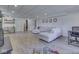 Large finished basement featuring a comfortable sectional sofa, a desk area, and stylish decor for versatile use at 6019 S Tacoma Ave, Indianapolis, IN 46227