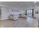 Finished basement with large sectional sofa, providing ample seating, and a cozy space for relaxation and entertainment at 6019 S Tacoma Ave, Indianapolis, IN 46227
