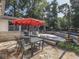 Outdoor living space featuring patio, dining, and outdoor cooking with backyard pool access at 6019 S Tacoma Ave, Indianapolis, IN 46227
