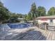 Relaxing pool area featuring a spacious deck, poolside seating, and refreshing water, ideal for summer fun at 6019 S Tacoma Ave, Indianapolis, IN 46227