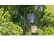 Overhead view of property, displaying home's location amongst lush trees and landscaping at 637 Olin Ave, Indianapolis, IN 46222