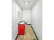 Bathroom with red vanity and grey countertop, showing toilet and need for updating at 637 Olin Ave, Indianapolis, IN 46222