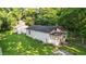 View of the home featuring a well-maintained lawn and traditional architectural details at 637 Olin Ave, Indianapolis, IN 46222